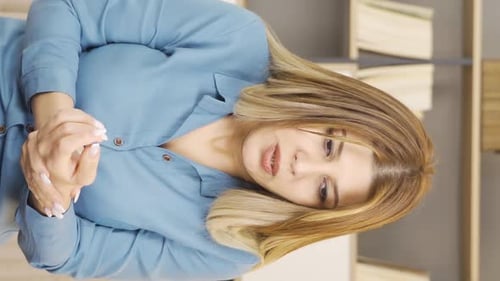 Woman Experiences Aches and Pains Indoors