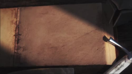 Mysterious Old Book Opening with Quill Animation