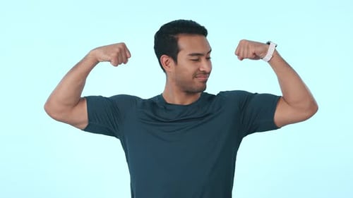 Fitness, flex and face of man in studio with muscles for exercise, bodybuilder training and workout