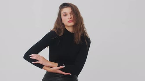 Attractive Woman Posing in Fashionable Black Outfit
