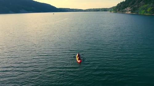 Two in a Canoe on a Large Lake