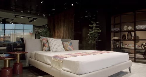 Elegant and Simple Bedroom With a King Sized Bed Interior with Wood on the Wall