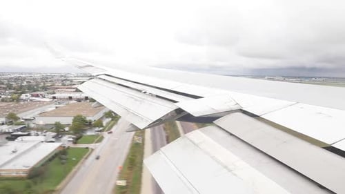 Airplane flying over Chicago before landing