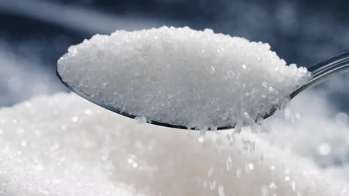 Closeup on a Blackblue Background White Crumbly Granulated Sugar Lies on It Crystal Sugar Spills