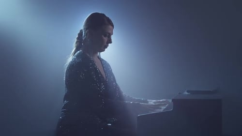 Pianist Playing Piano in Smoky Studio Young Woman in Dress Plays the Piano