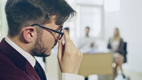 Close Up Portrait of Attractive Businessman at Workplace