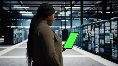 Green Screen Laptop and Tablet Closeup for Equipment Checkups and Infrastructure Maintenance
