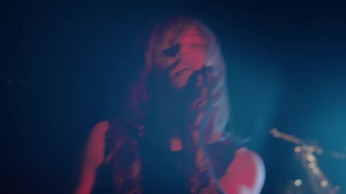 Woman with Lace Glove Dances in Red and Blue Light