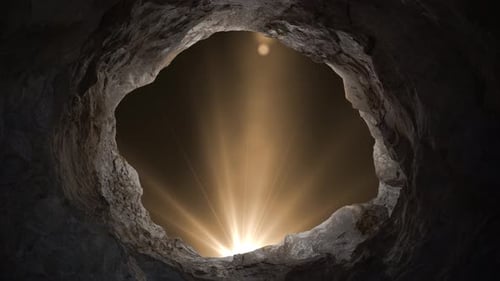 Dramatic Light Rays Emerge from Dark Cave Entrance Loop