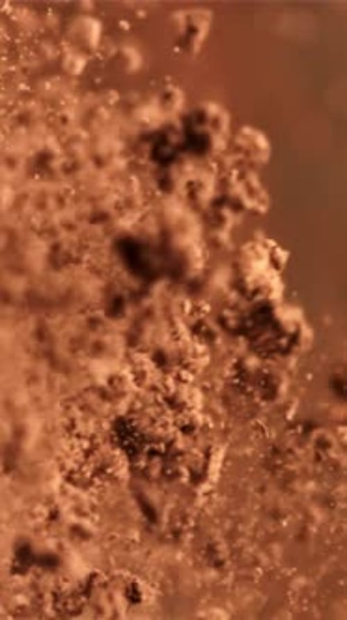 The Cocoa Powder Falls Down Filmed on a Highspeed Camera at 1000 Fps