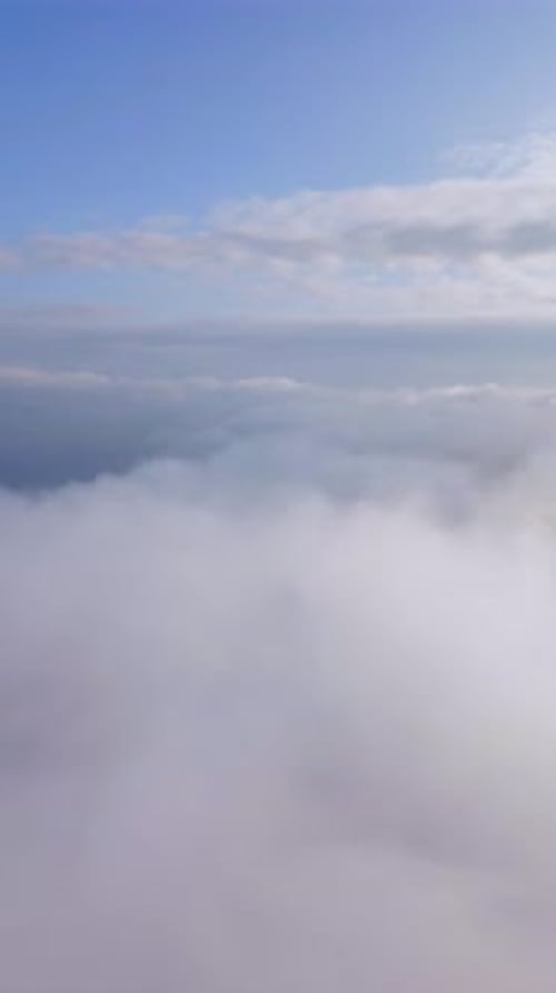 Aerial Shot of Billowing Clouds Under Blue Sky