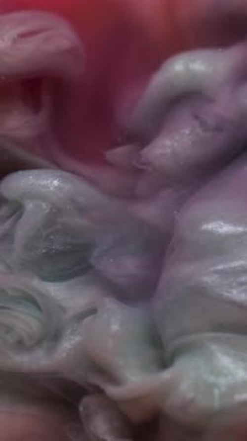 Swirling Blue and Pink Abstract Ink Background