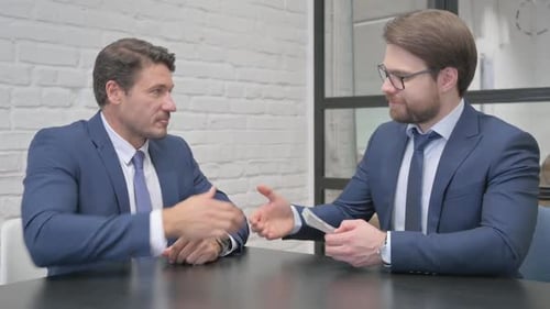 Hand Shake by Business People after Money Payment