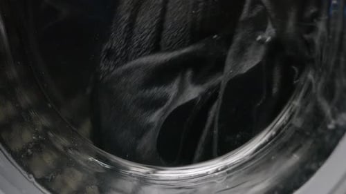Washing Machine Spinning with Laundry in the Wash Cycle