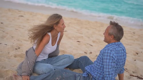 Romantic Middleaged Couple Enjoying a Peaceful Evening Together on the Beach Love Connection and