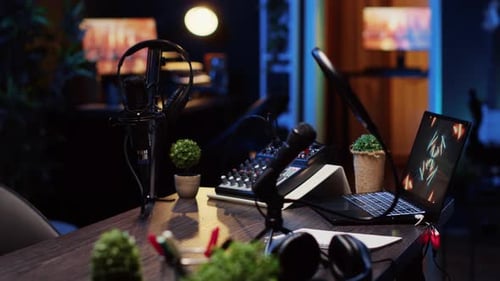 Panning Shot of Desk in Home Production Studio with Podcast Equipment Technology Recording