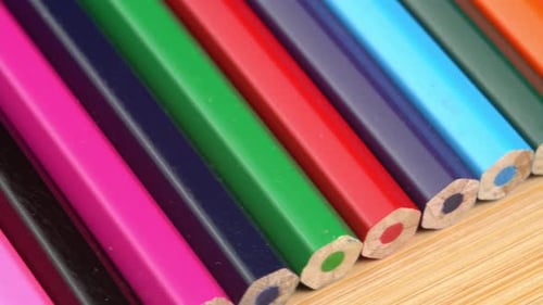 Row of Vibrant Colored Pencils Close-Up
