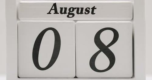 Wooden Block Calendar Changes Dates in August