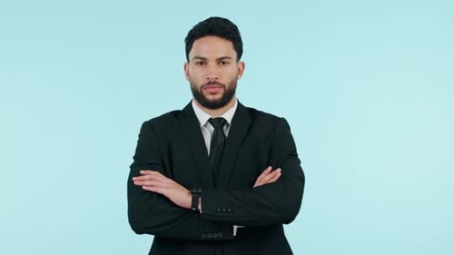 Serious businessman, arms crossed and professional in management against studio background