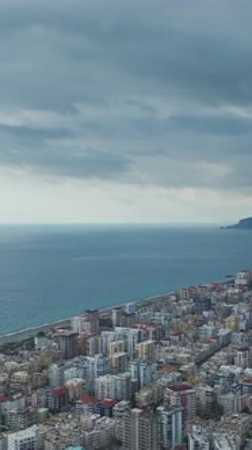 Vertical Video Scenic Aerial Perspective of a Small Town on the Mediterranean Coast With Urban and