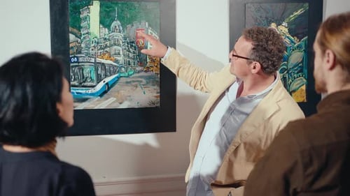 Senior Tour Guide Speaking about Artwork during Gallery Tour