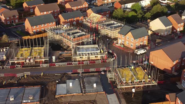 New housing development neighbourhood aerial view over property framing ...