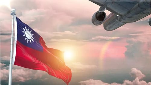 Taiwan Flag Waving with Passenger Plane Flying Over Sunset Clouds