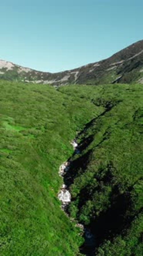Aerial View Flying Over Mountain Valley with River Media