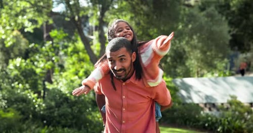 Nature, piggyback and father with child in park for playing, having fun or bonding together