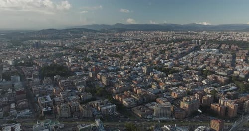 Aerial view of urban cityscape with mountains and roads, Colombia.