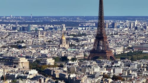 Aerial Ascending Footage of Popular Eiffel Tower and Surrounding Buildings in City Center Cinematic