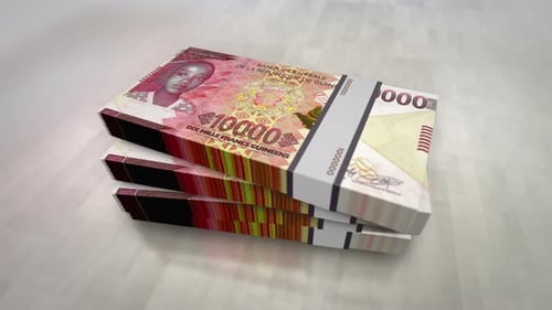 Guinea francs money banknote pile packs