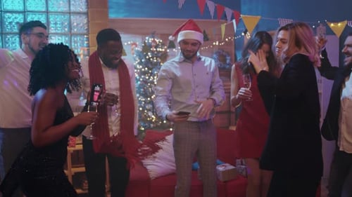 Friends Dance and Celebrate at Christmas Party