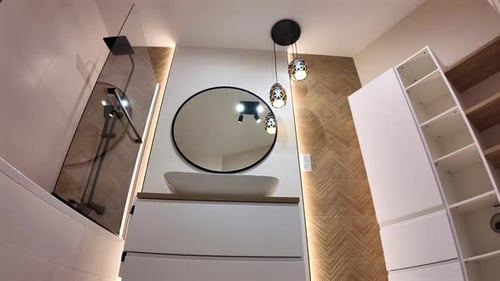 View Of Elegant, Modern Bathroom In A Stylish, Classical Home.