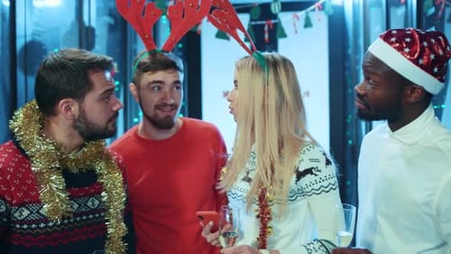 Friends celebrate Christmas in server room, Christmas party
