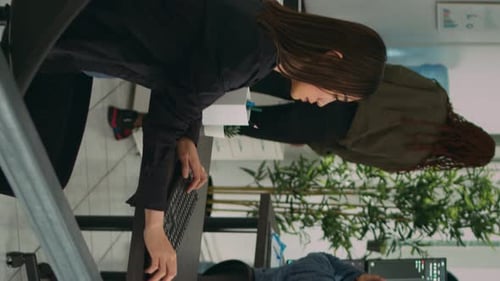 Vertical Video Woman Programer Typing Source Code on Computer Keyboard