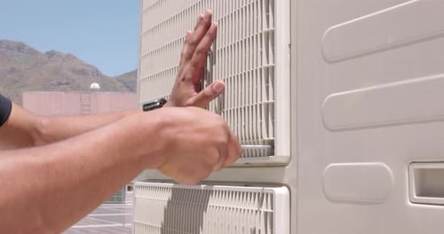 Building, construction and hands of a man doing installation, service and repair on an appliance