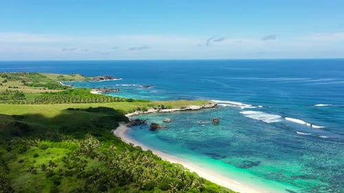 Tropical Island with a Lagoon and White Sandy Beach