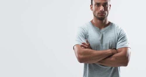 Young Adult Man with Arms Crossed Portrait