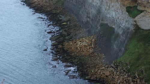 Static shot of the fallen rocks from a landslide of the cliff above