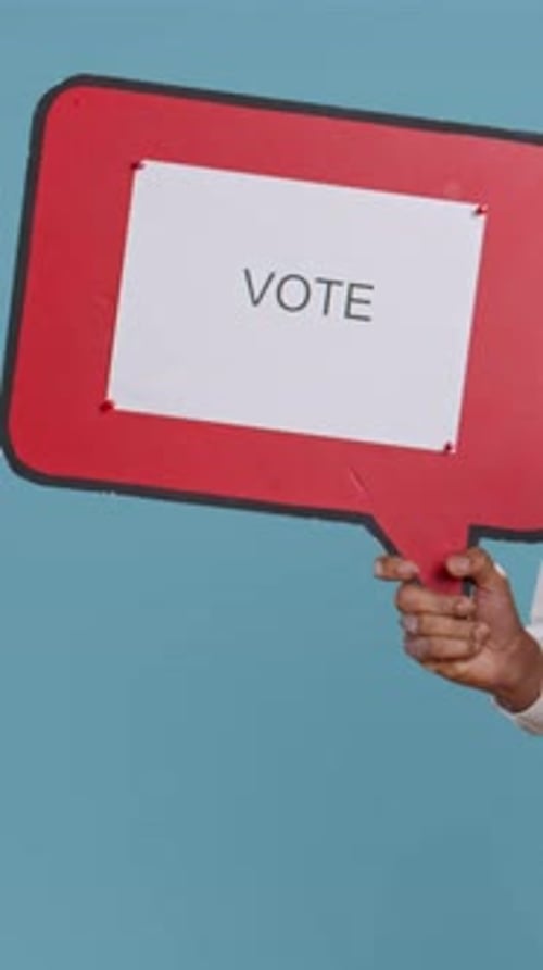 Vertical Video Hotel Concierge Advertising a Vote Message on Speech Bubble Sign