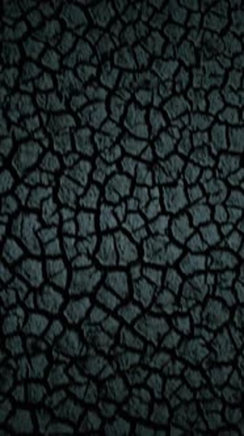 Abstract Cracked Texture on Dark Surface