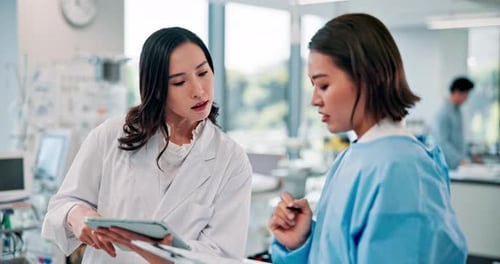Women Scientists Collaborating in a Modern Laboratory