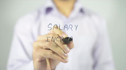 Writing Salary Increase on Transparent Surface