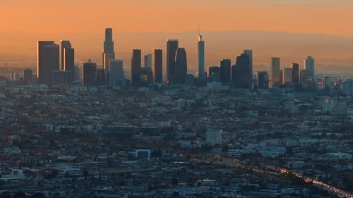 Aerial Sunrise Over Downtown Los Angeles with Morning Traffic