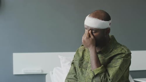 Injured Black Soldier In Hospital Room