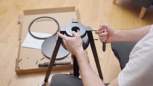 Assembling Modern Black Table at Home