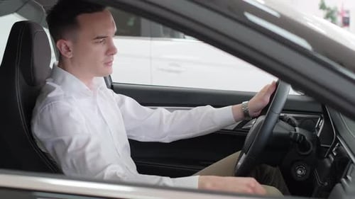 Young Adult Man Inside of a Car