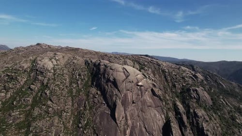 Flying Over Stunning Mountain Rocks