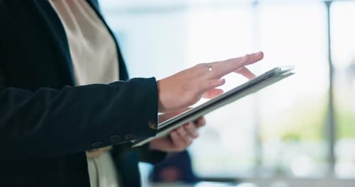 Close Up of Hands Using Tablet in Office